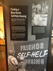 Self-Help housing signs from AFSC's 100's anniversary exhibit.