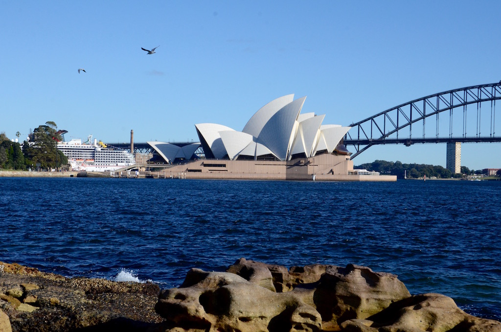 A classic angle of the Sydney opera house from across the harbor.