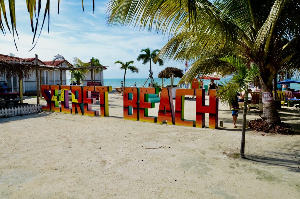 Sign on a beach that reads Secret Beach