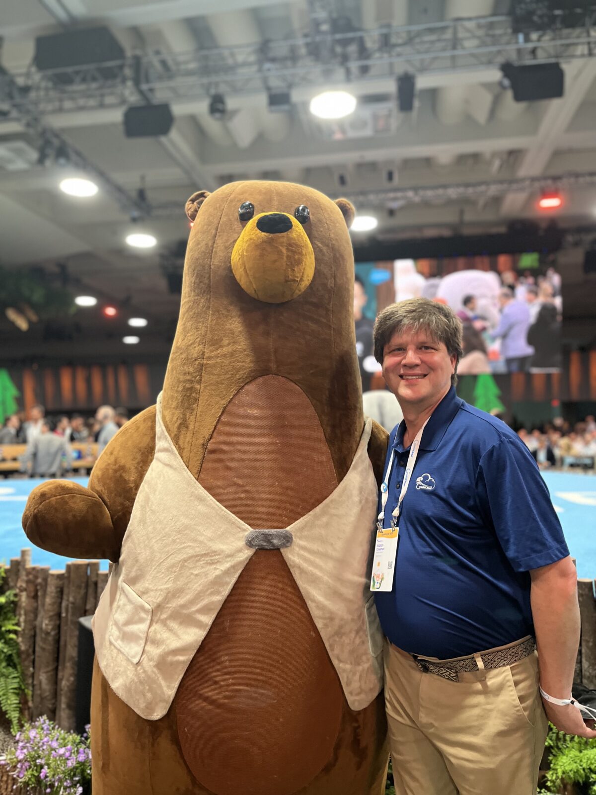 A picture of myself standing the Kody, the Salesforce developer mascot